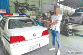 男子喝点小酒撒疯 砸警车被拘留图片