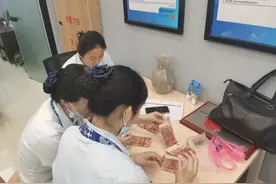 遇到污损人民币无需慌，建行湖州青铜路支行来支招图片