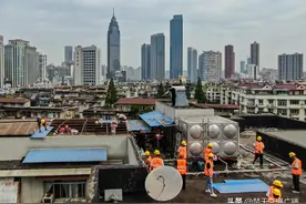 助力老旧小区改造 武汉市江汉区北湖街建设社区集中拆除楼顶违建500多平方米图片