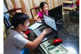 新加坡小学生在家上课第一天，有人欢喜有人愁~图片
