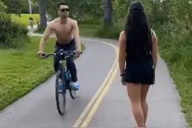 恶心！加拿大肌肉男骑自行车，竟向华人女生吐口水，还吐在脸上图片