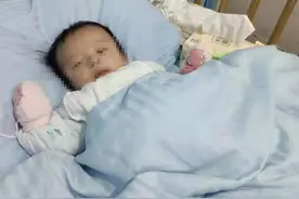 新生儿患罕见病  父母为给儿子省钱看病除夕夜宿上海大桥底 心有不甘又无能为力 希望有好心人能帮助图片