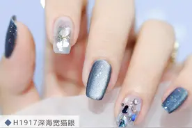 一组宽猫眼胶和贝壳片完美搭配的美甲，太美！太仙图片