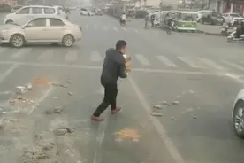获奖！洛阳小伙徒手清理路面碎石，获得天天正能量特别奖图片