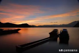 泸沽湖和她的船图片