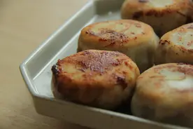 一口飙汁的门钉肉饼——北方人落到实处、踏踏实实的食物图片