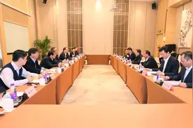 周伟会见苏州城投公司党委书记、董事长张涛图片
