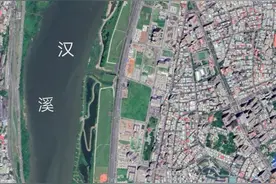 从空中看台湾省台北市，坐落盆地中被新北环绕图片