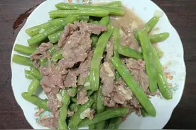 豆角炒牛肉，一款荤素搭配的营养菜肴图片