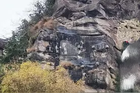 万州青龙石对面的白虎头，明明比青龙高为何还趴在那里一动不动？图片