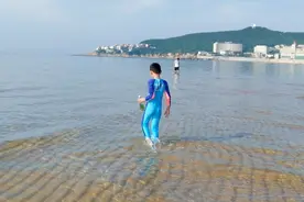 山东这片海滩，面积大、水质干净、沙子细软、食宿方便，值得去图片