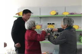 爱心超市不歇业 智志双扶显实效图片