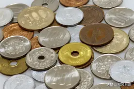 为什么日本硬币中的"5日元"和"50日元"有个洞？图片