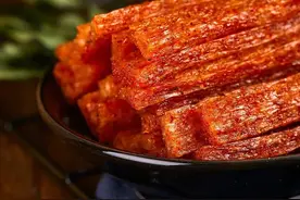 一年卖出412亿，中国人到底多能吃辣条？图片
