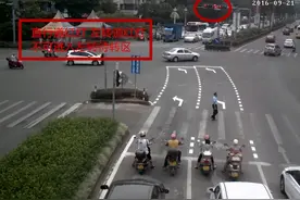 车身已经过了停止线，才发现前面是红灯，该停车还是继续走图片