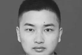 广西南丹农贸市场火灾一消防员牺牲 年仅26岁图片