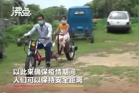 为保持社交距离  印度发明3米长摩托车图片