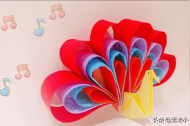 折一只简易版的小孔雀，折法简单，很容易就学会了图片