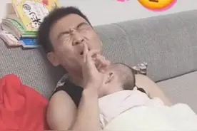 小声点，哄孩子多难孩子醒了你来哄啊，宝爸的动作逗笑宝妈图片