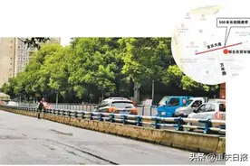 隔离带不设人行通道 车库出入口划实线 标志标线自相矛盾造成拥堵——这些道路设计，为何群众喊不便图片