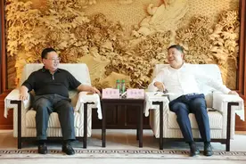 李永明与商务部中国对外贸易中心副主任王彦华会谈图片