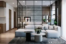 现代开放式公寓设计，用玻璃墙隔出一间卧室图片