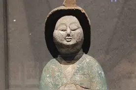 唐代肥妞一枚（新疆维吾尔自治区博物馆馆藏）图片