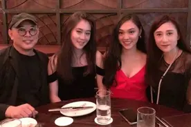 57岁李连杰与20岁女儿现身三亚，网友却说：颜值远不如利智图片