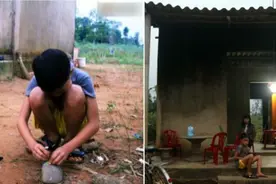 越南9岁男童一个人生活两年多，家门口就是坟堆，日夜盼母归图片