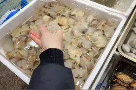 买海螺的时候记得挤掉水，直接买就亏大了，这是香辣猫眼螺的做法图片