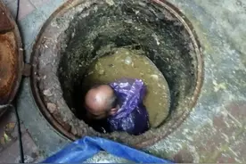 桂林市灵川县这名保安大叔火了，除夕夜在化粪池徒手疏通管道，50多岁的他曾经当过地质队员图片