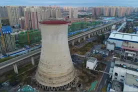 石家庄85米高地标成功拆除，系国内首次临近铁路客专定向拆除图片