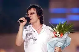 18年前爆火的《丁香花》，唱的亡者究竟是谁？坟前开满鲜花了吗？图片