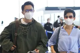 韩庚和混血老婆走机场，棉服搭靴子成五五分，卢靖姗穿皮衣太霸气图片