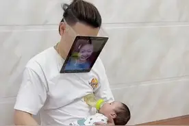 广东男子为哄娃煞费苦心，用胶带将妻子照片贴脸上，宝宝反应亮了图片