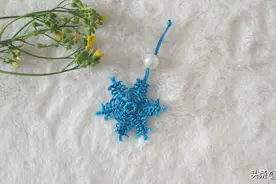 手工创意DIY 雪花挂饰编法教程图片
