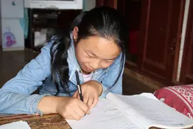 11岁的小小“持家”人，用微笑将生活中的苦化成甜图片