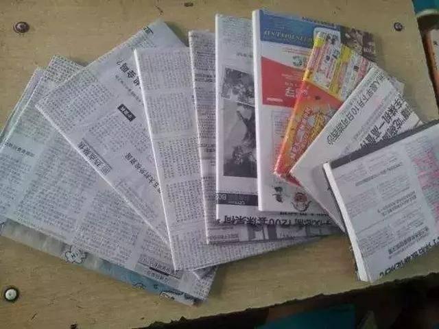 五花八门的,看不清楚是语文还是数学的图书就热闹的很,那里有的用报纸