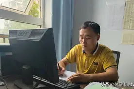 高考尖子背后的功臣：杨红旺图片