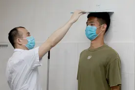 我国18到44岁男女平均身高：169.7厘米和158.0厘米图片