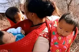 外出打工的丈夫过年回家，看到村口一女子抱着孩子，心碎不已图片