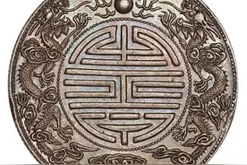 双龙寿字币将再现身拍卖会，却与博物馆馆藏存异，孰真孰假图片