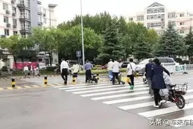 电动车“新规”来袭，斑马线既然要下车推行？引起许多民众的热议图片