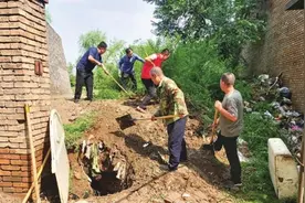 大雨频降路面塌陷 大同社区及时修复解民忧图片