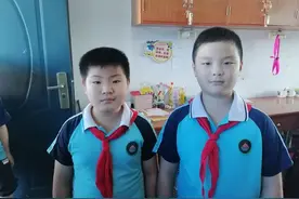 路人受伤倒地，岳阳两名学生的举动，值得点赞图片