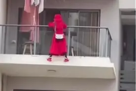 红衣女子25楼阳台外跳舞坠楼，“房内留有遗书”图片