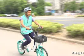 徐州共享电动“小绿车”要来了 戴好头盔准备上路图片