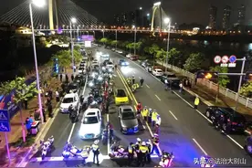 上百名交警、特警在南宁滨江路青山大桥段围堵出击，97辆车落网！图片