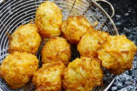炸萝卜丸子，面粉淀粉都不加，多放这2样，金黄香酥脆，外酥里嫩图片