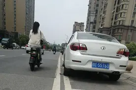 非机动车道改成停车位，电动车“无路可走”为何不管？获得了回复图片